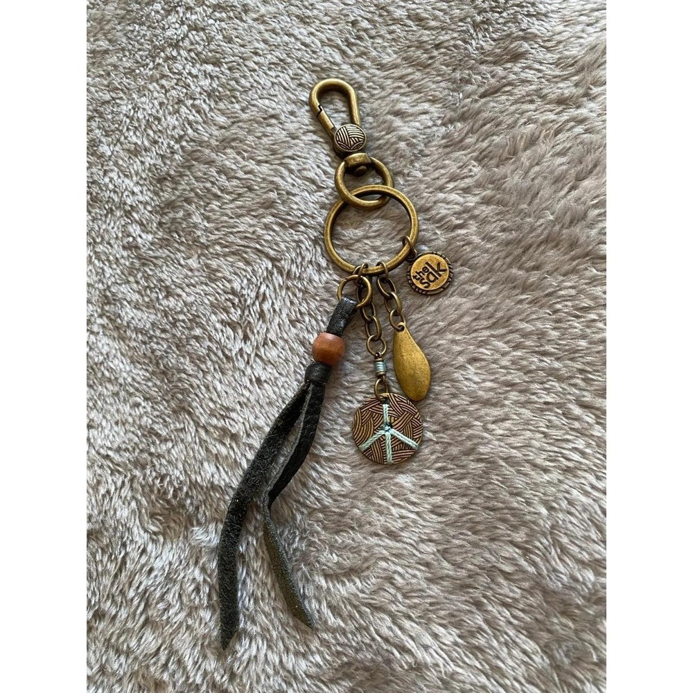 The Sak Keychain Charm Metal Leather Bead
